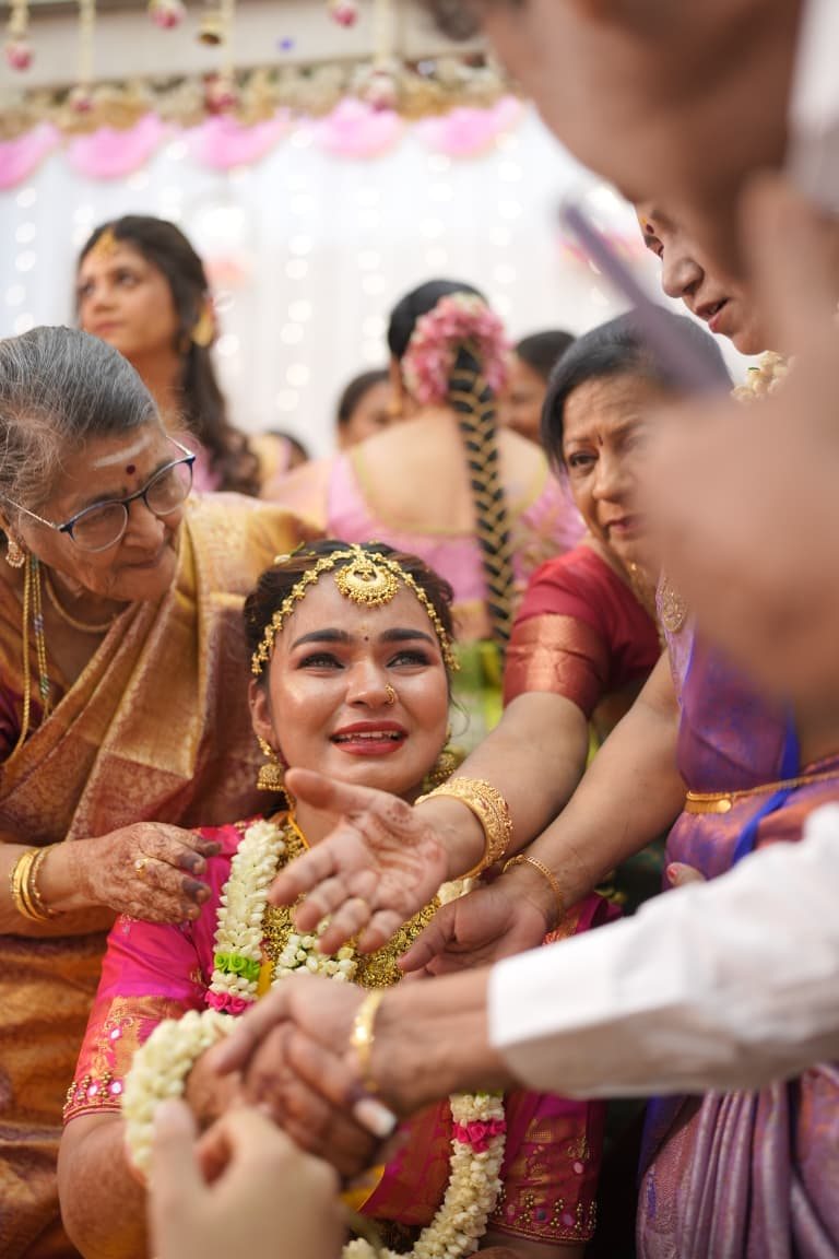 Haldi group candid photography — cinematic wedding photography Chennai Pugaippadam